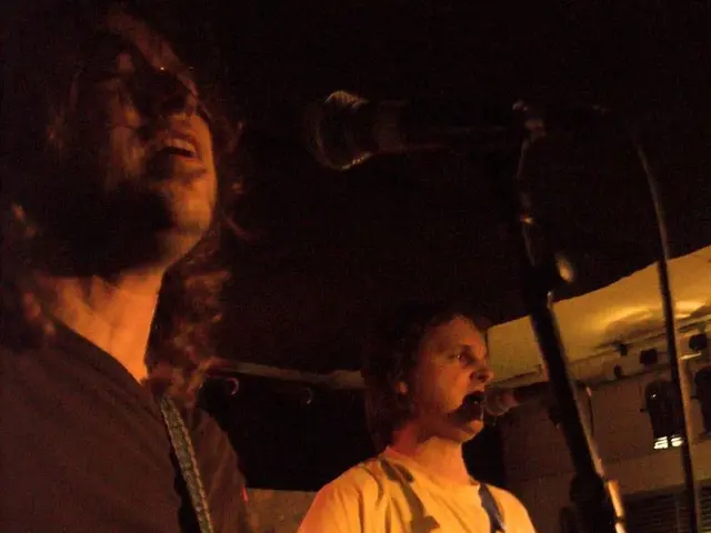 Music artist Ed Sheeran performs at an old school following his call for £250 million investment in...