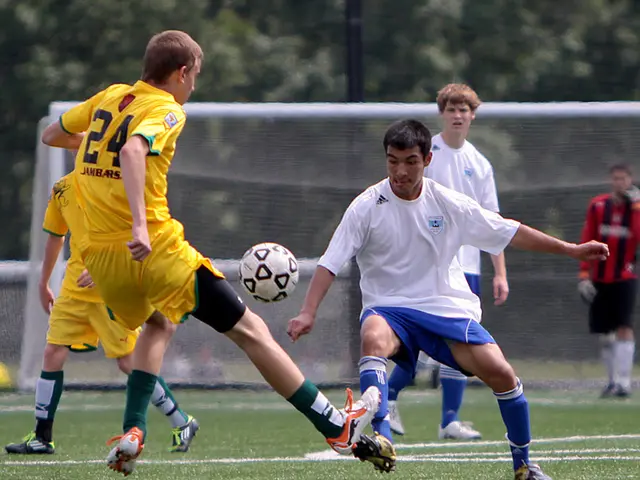At the bottom of this image, there are players in yellow and white color t-shirts, playing football...